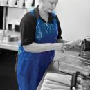 Picture of Shield Blue Aprons on a Roll Light Duty 8 micron 1000/case